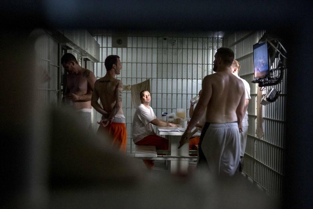 Best of Show - Jessica Phelps / Newark Advocate, “Life Locked Up in the County Jail”Inmates in cell block B at the Coshocton County Justice Center pass the time watching TV and talking January 14, 2020. The more violent offenders, usually awaiting trial, are placed in the two cell blocks while low level offenders are in more open areas. 